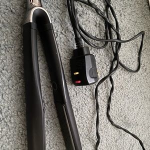 GHD malfunction hair straightener black